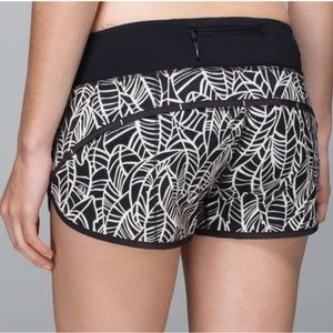 Lululemon white/black speed shorts; leaf print, size 4